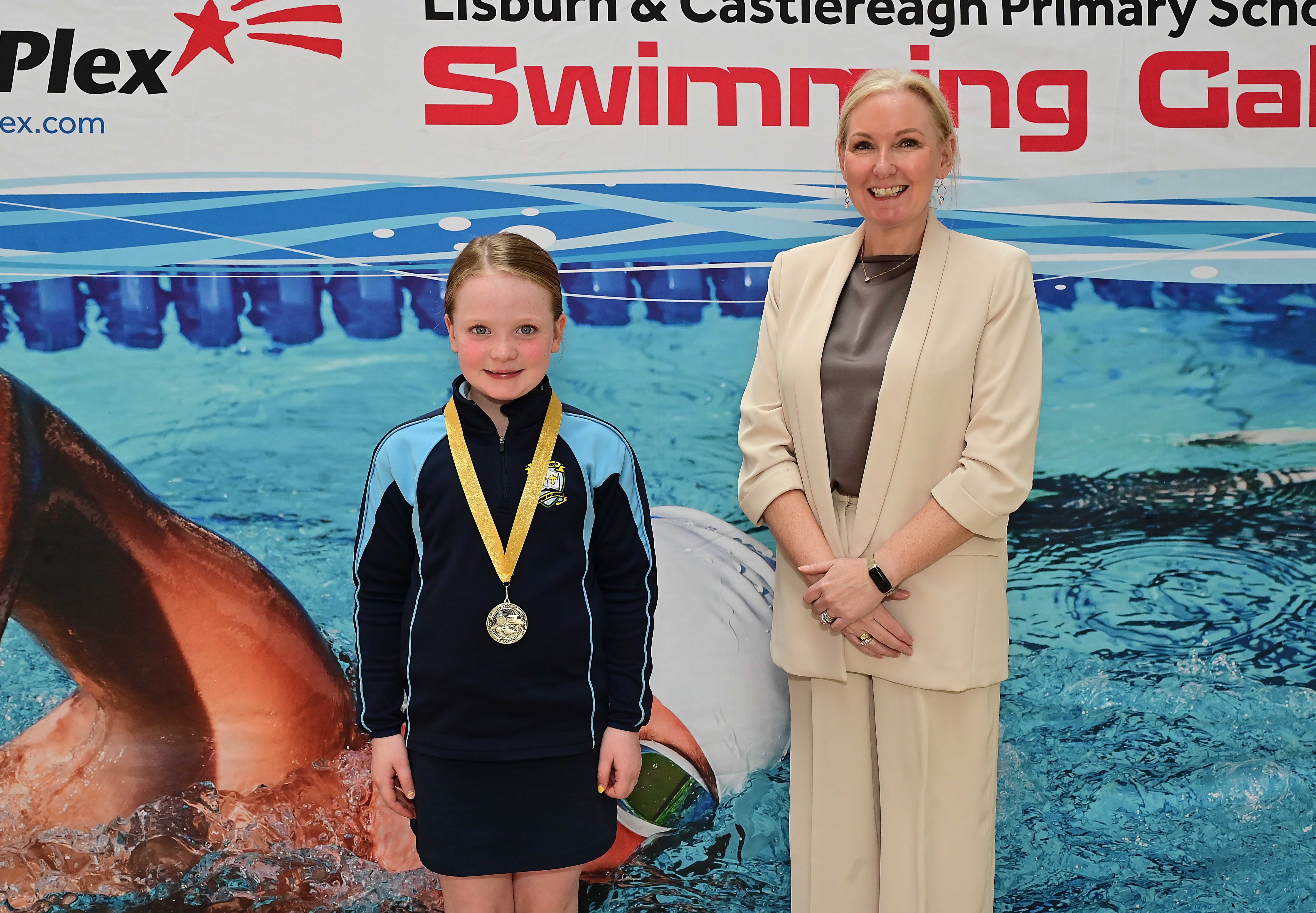 Louise Moore, Director of Leisure & Community Wellbeing presents Event 10 Freestyle to Club winner in 1st place, Camille Bowman (St Joseph’s) 