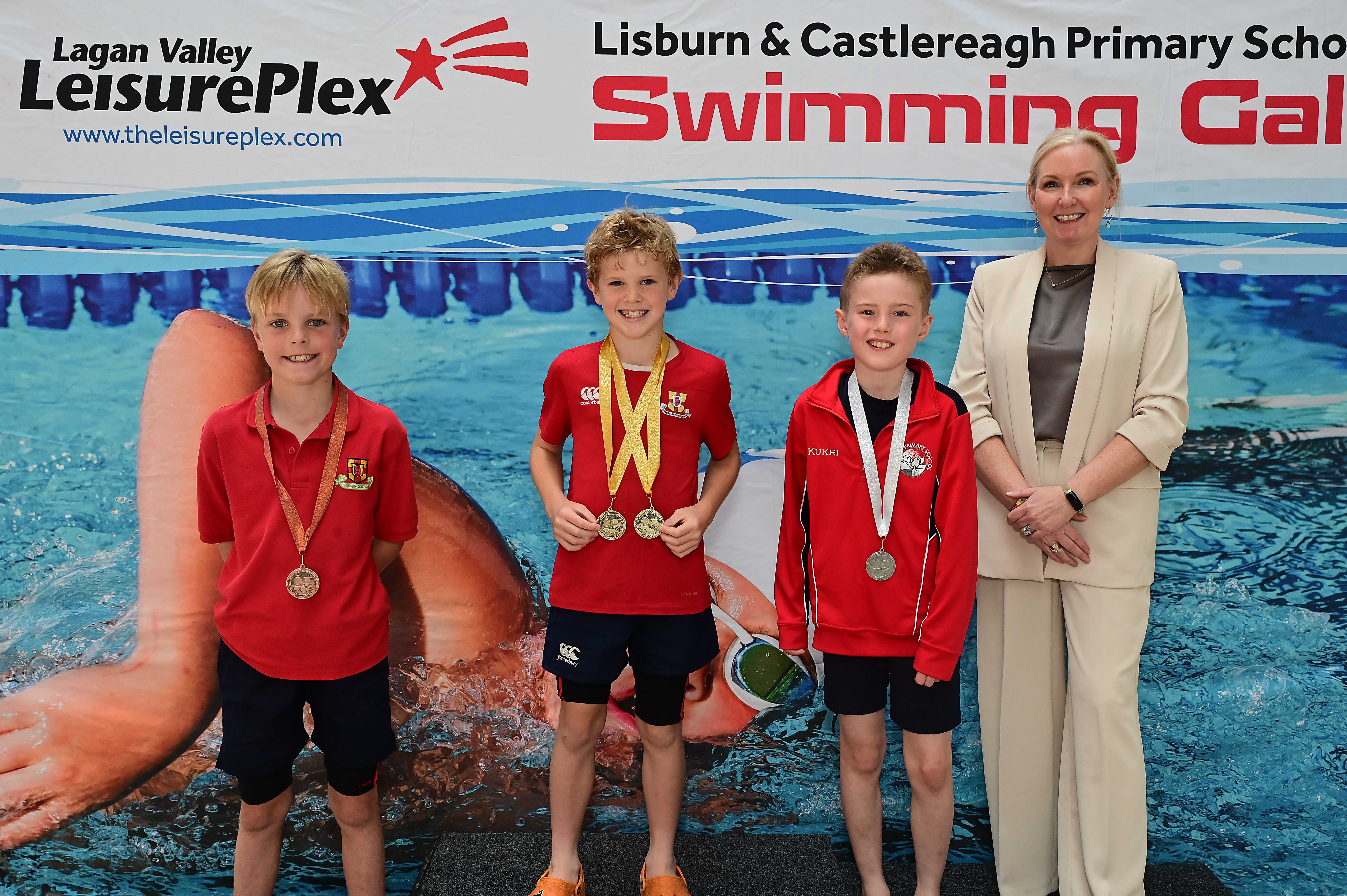 Louise Moore, Director of Leisure & Community Wellbeing presents Event 11 Freestyle (non-club): 1st Artie Mawhinney (Friends’ Prep), 2nd Harry Warnock (Moira) and 3rd Rory Bossom (Friends’ Prep) 