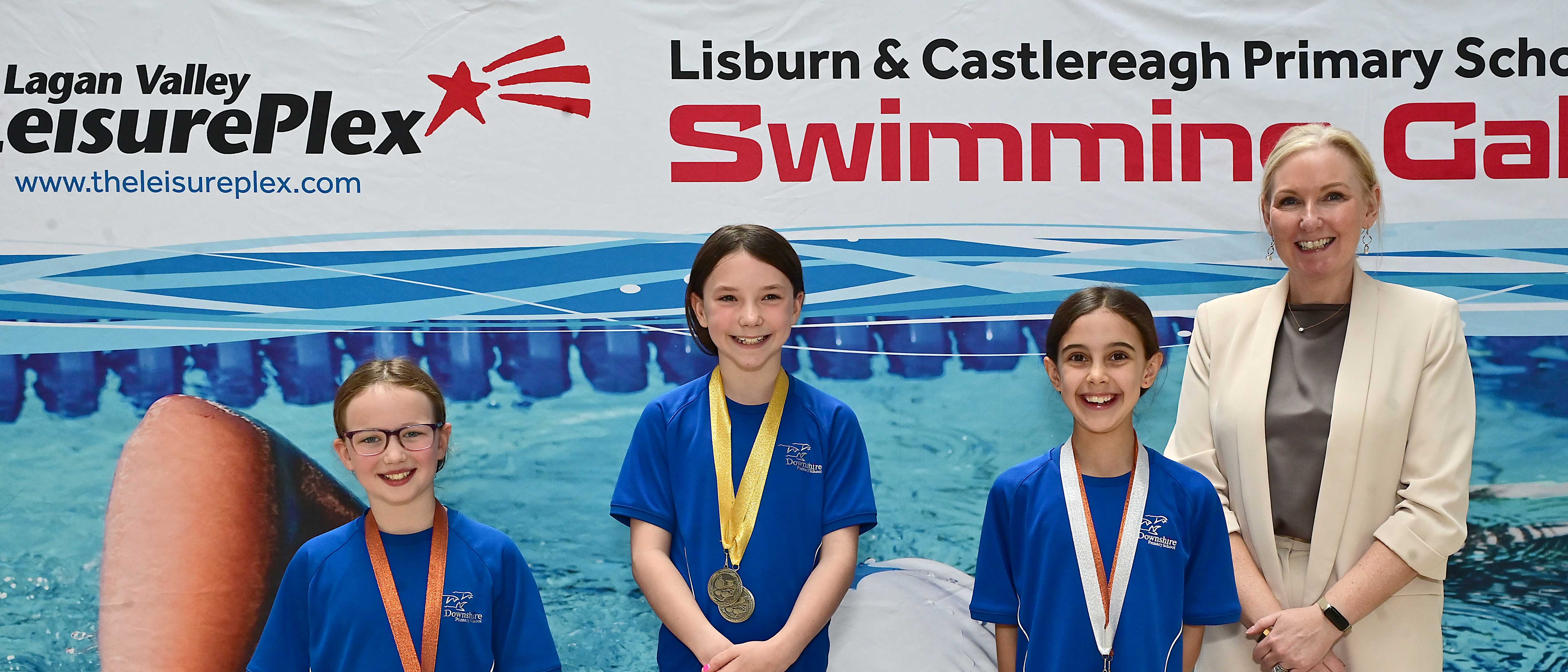 Louise Moore, Director of Leisure & Community Wellbeing presents Event 12 (Club) to 1st Ivy Carson (Downshire), 2nd Madeleine Cubitt (Downshire) and 3rd Sophie Lonton (Downshire) 