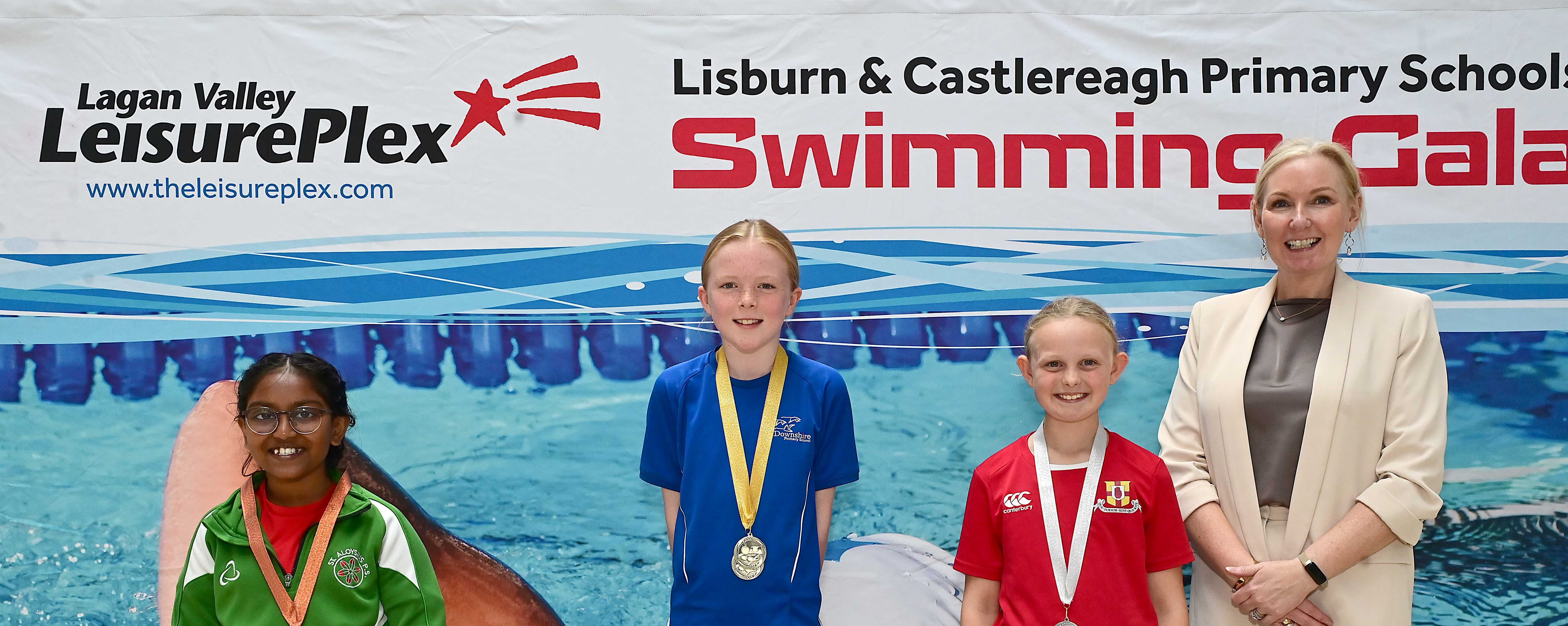 Louise Moore, Director of Leisure & Community Wellbeing presents Event 12 (non-club):1st Katie Reid (Downshire), 2nd Anna Bell (Friends’ Prep) and 3rd Ivana Berlin (St Aloysius) 