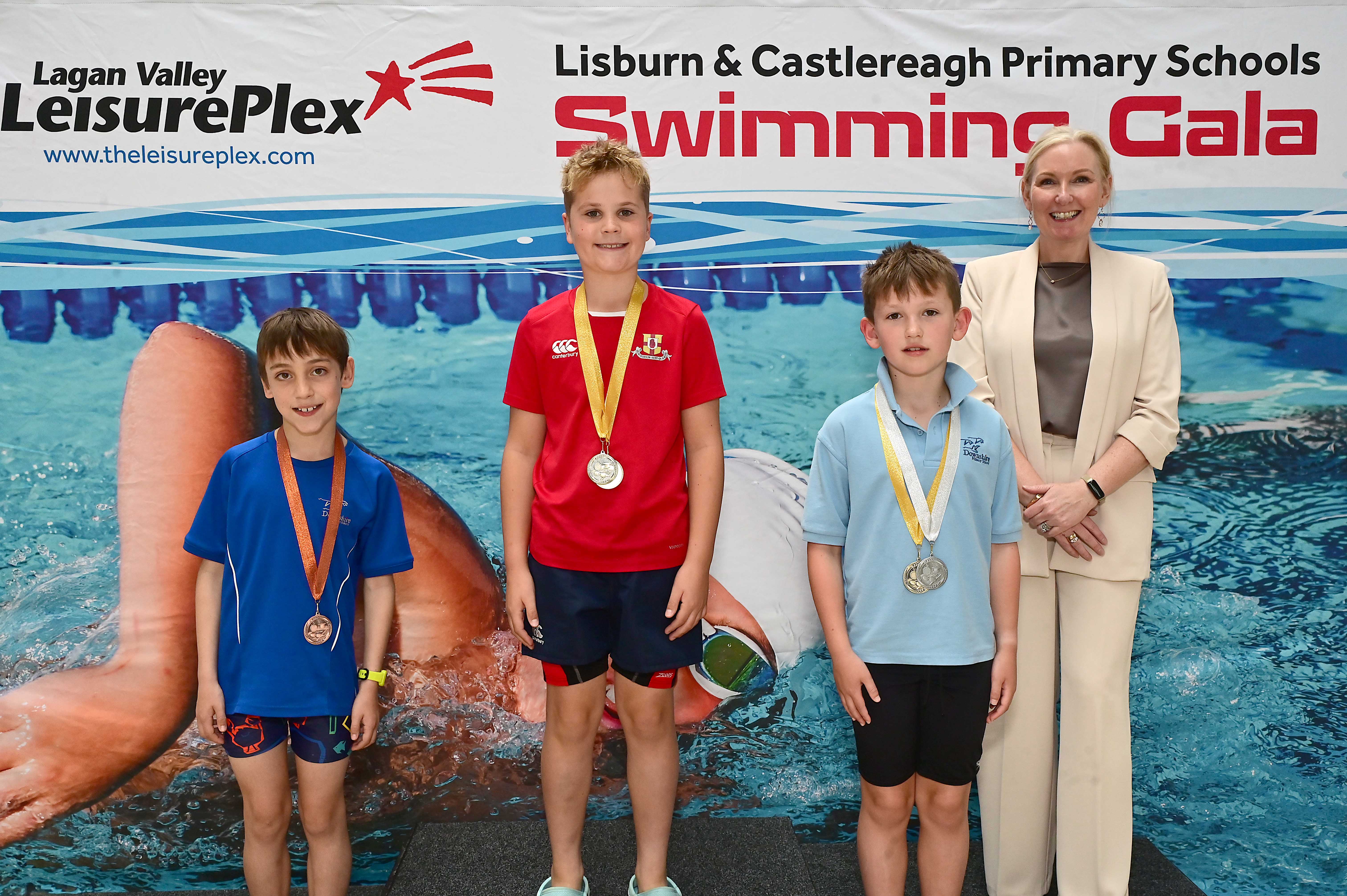 Louise Moore, Director of Leisure & Community Wellbeing presents Event 13 Butterfly (non-club): 1st Teddy Lewis (Friends’ Prep), 2nd Zachery Summers (Downshire) and 3rd Ze Harrison De Figueinel (Downshire)  