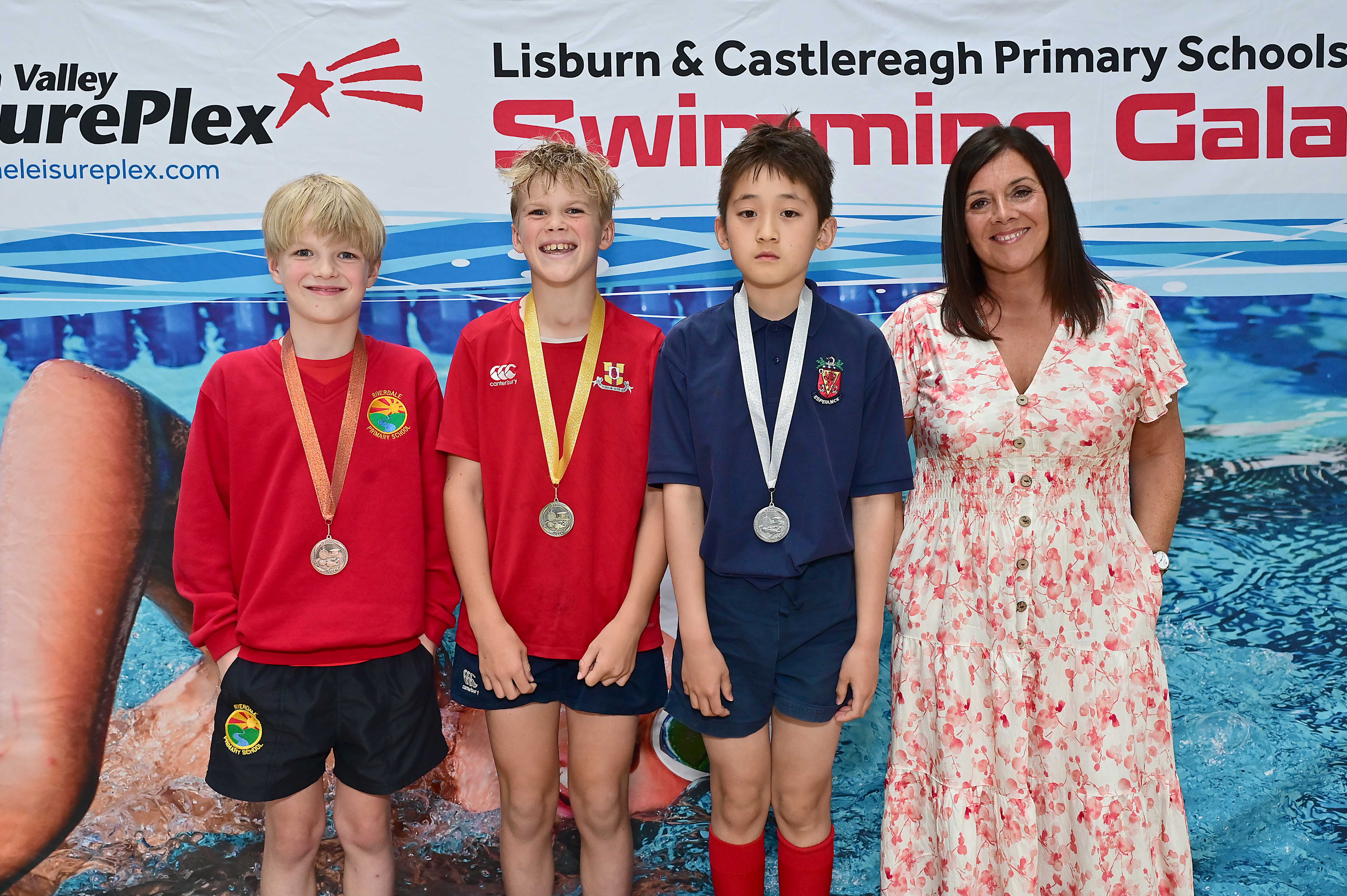 Chair of Communities and Wellbeing Committee, Councillor Sharon Lowry presents Event 20 Breaststroke (Non-club): 1st Freddie Mawhinney (Friends’ Prep),    2nd Harry Liang (Wallace Prep) and 3rd Patrick Curry (Riverdale)  