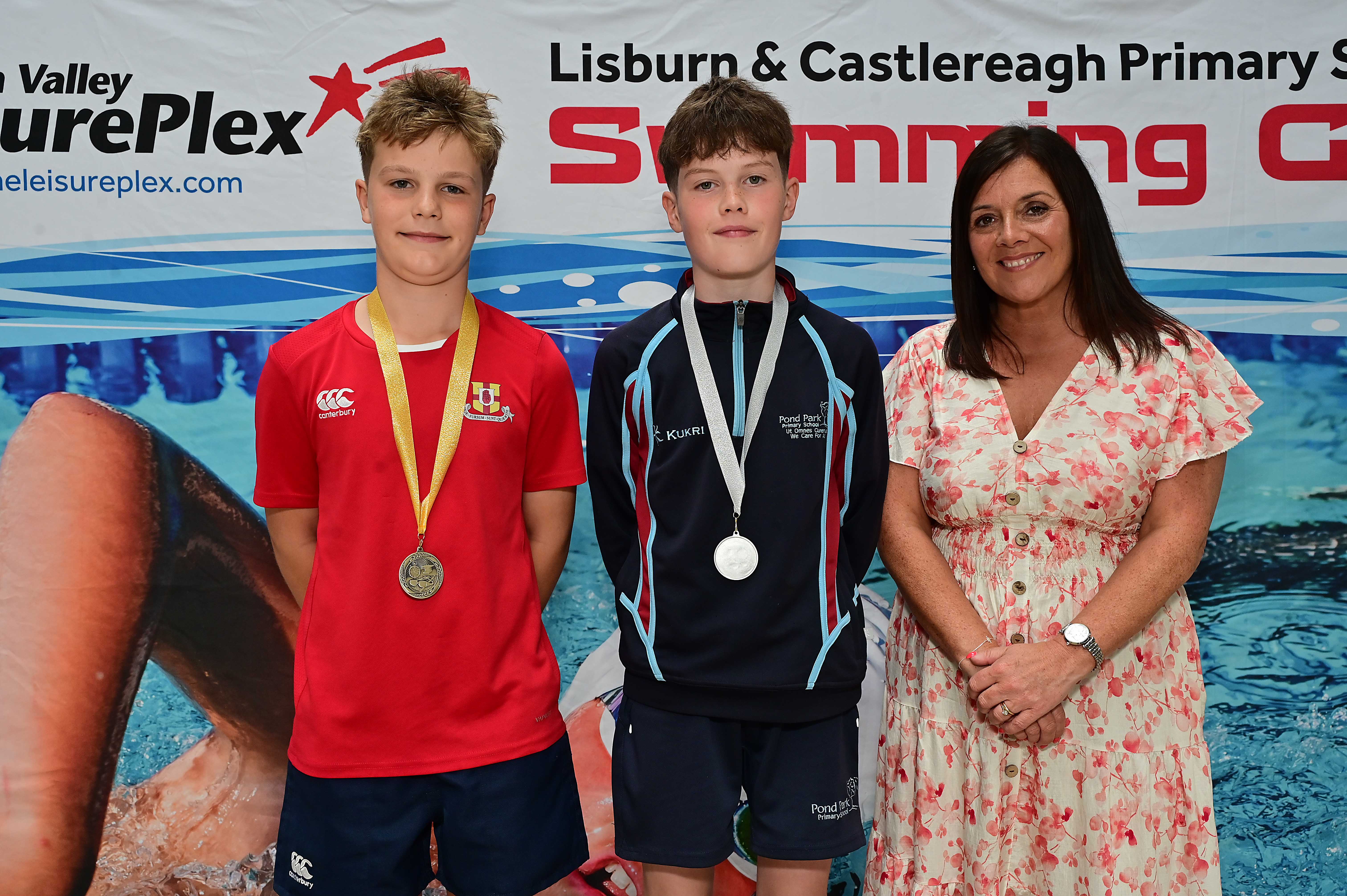 Chair of Communities and Wellbeing Committee, Councillor Sharon Lowry presents Event 22 Breaststroke (Non-club): 1st Joseph Lewis (Friends’ Prep), 2nd Joshua Wright (Pond Park) and 3rd Rory Gunn (Ballymacash)  