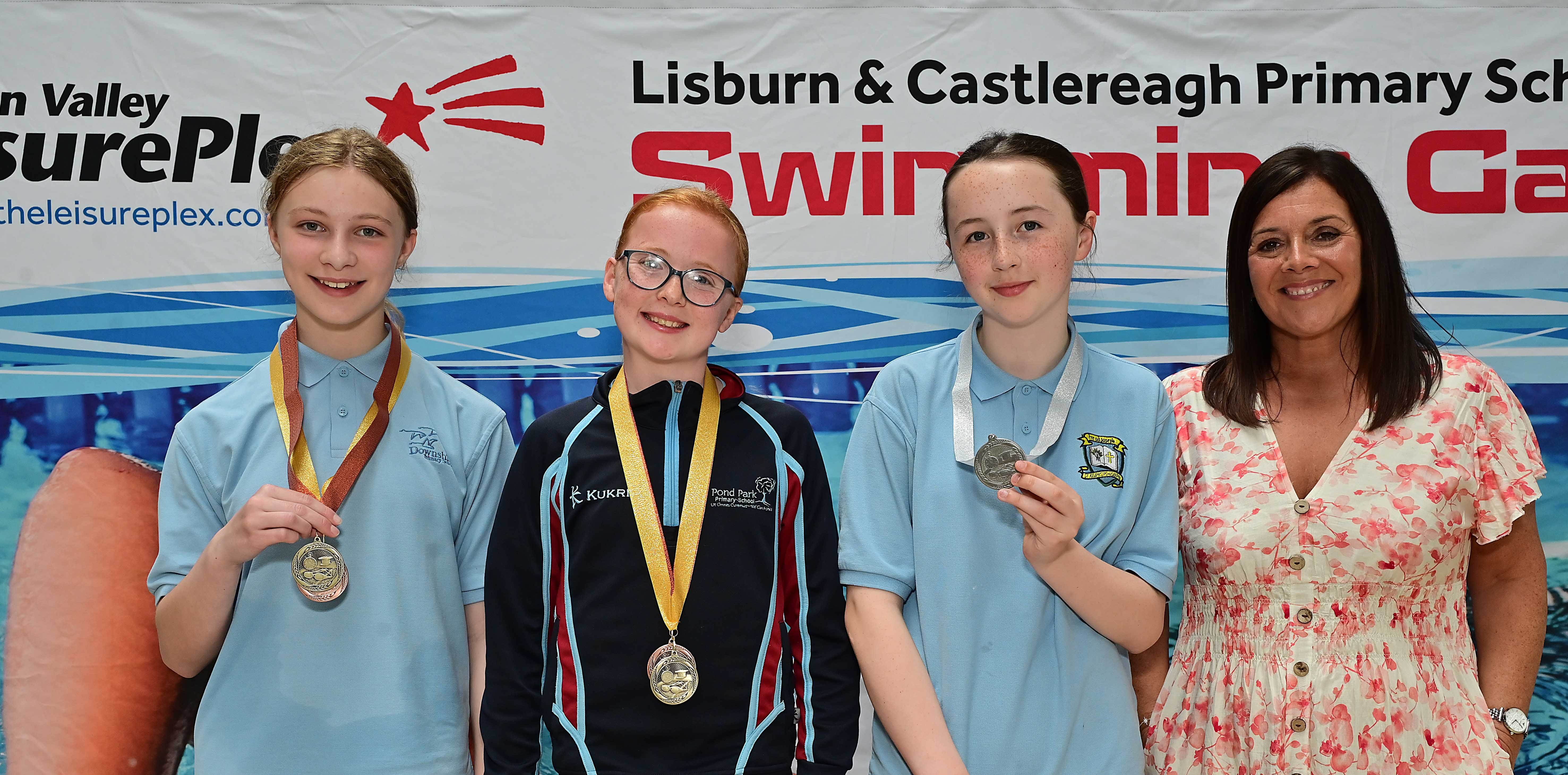 Chair of Communities and Wellbeing Committee, Councillor Sharon Lowry presents Event 27 Freestyle (Non-club): 1st  Pippa-Rose Beattie (Pond Park),    2nd Leah Bartley (St Joseph’s) and 3rd  Mia Lovell (Downshire)  