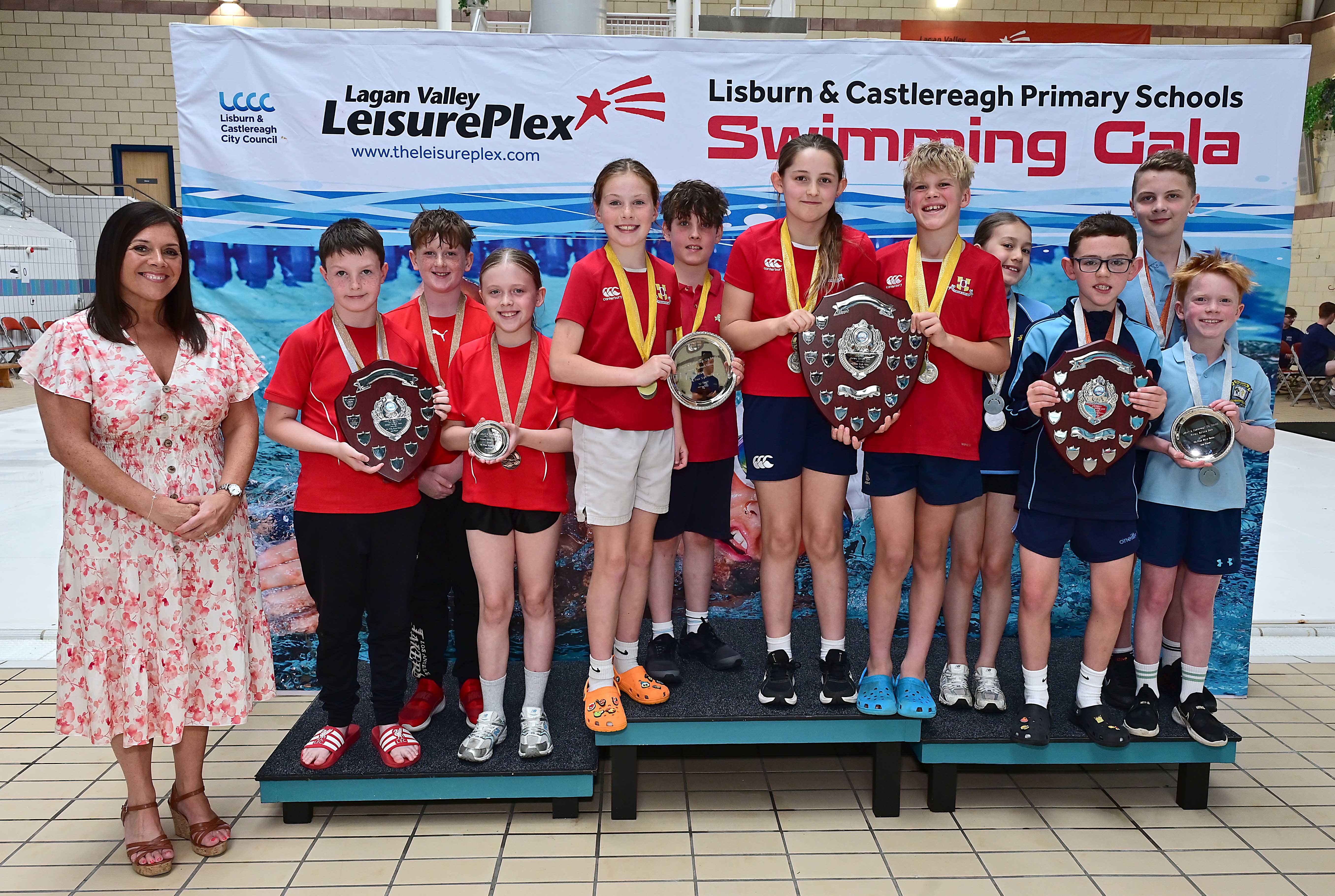 Chair of Communities and Wellbeing Committee, Councillor Sharon Lowry presents Event 32 P6 Freestyle relay to Friends’ Prep in first place, St Joseph’s Primary School, Lisburn in second place and St Aloysius Primary School in third place.  
