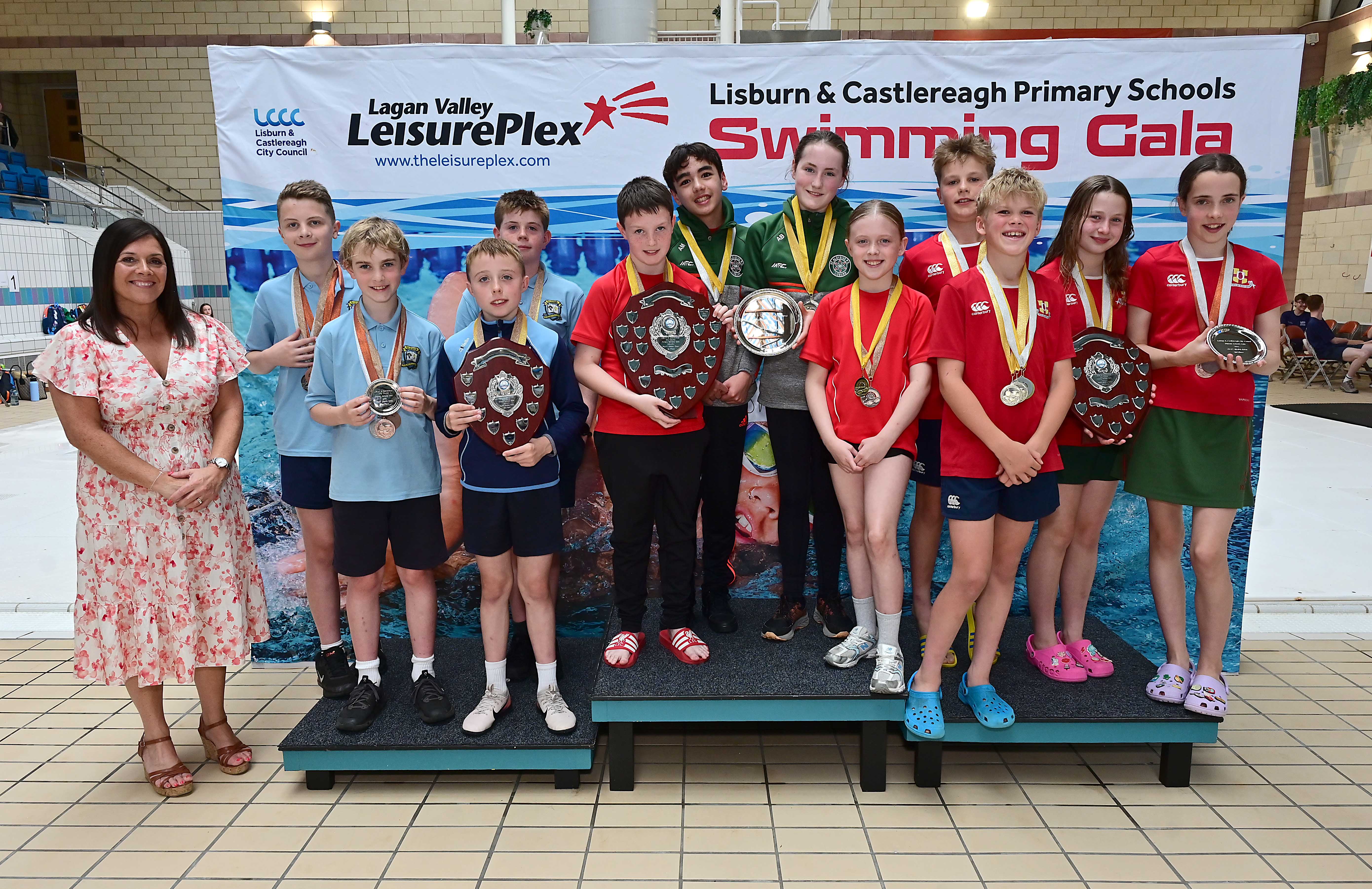 Chair of Communities and Wellbeing Committee, Councillor Sharon Lowry presents Event 33 P6/P7 Medley relay to St Aloysius Primary School in first place, Friends’ Prep in second place and St Joseph’s Primary School, Lisburn, in third place.  