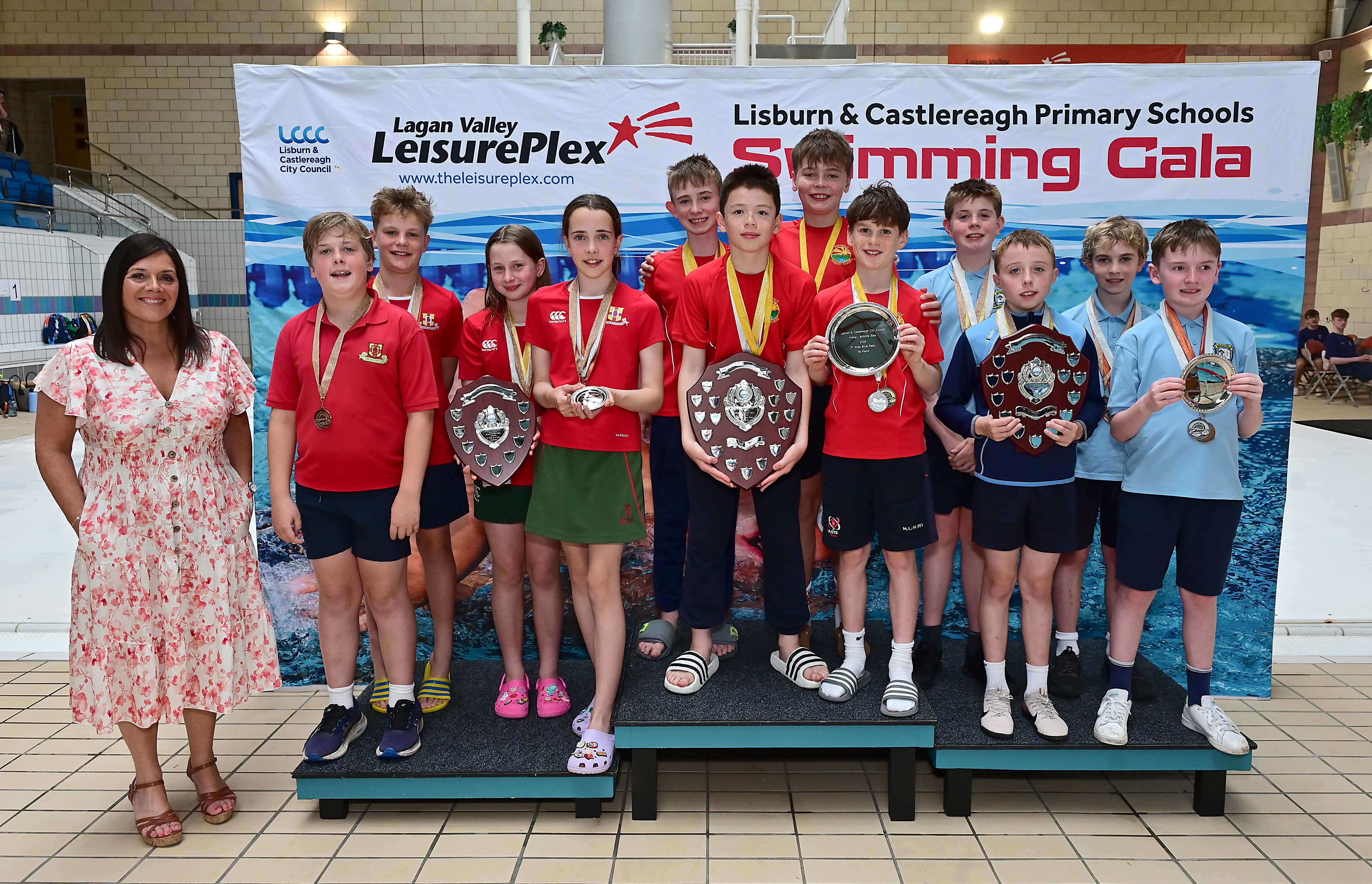 Chair of Communities and Wellbeing Committee, Councillor Sharon Lowry presents Event 34 P7 Freestyle relay to Riverdale Primary School in first place, St Joseph’s Primary School Lisburn in second place and in third place, Friends’ Prep.  