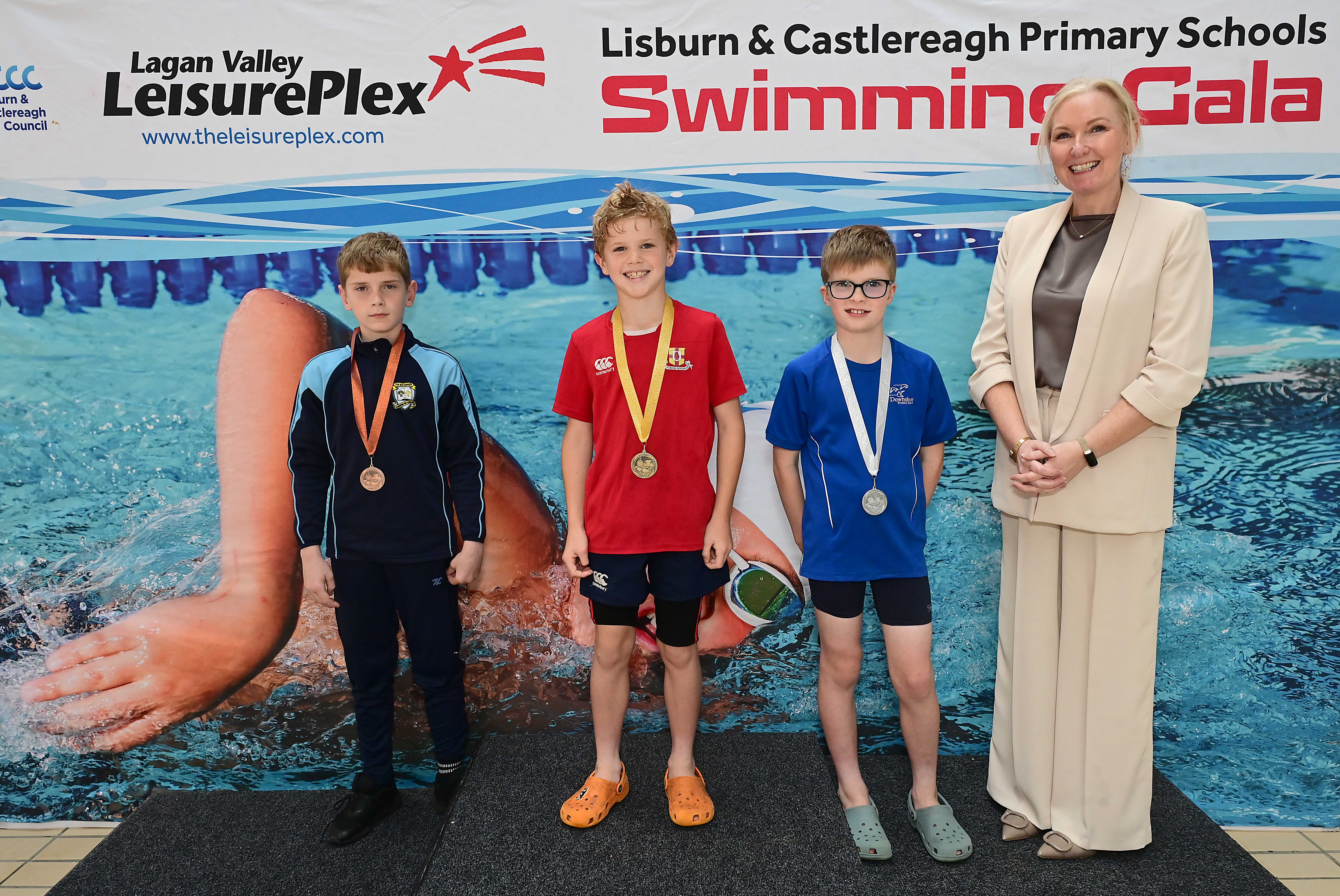 Louise Moore, Director of Leisure & Community Wellbeing presents Event 3 Backstroke (non-club swimmers): 1st Artie Mawhinney (Friends’ Prep), 2nd Michael Spence (Downshire), 3rd Harry Neill (St Joseph’s)