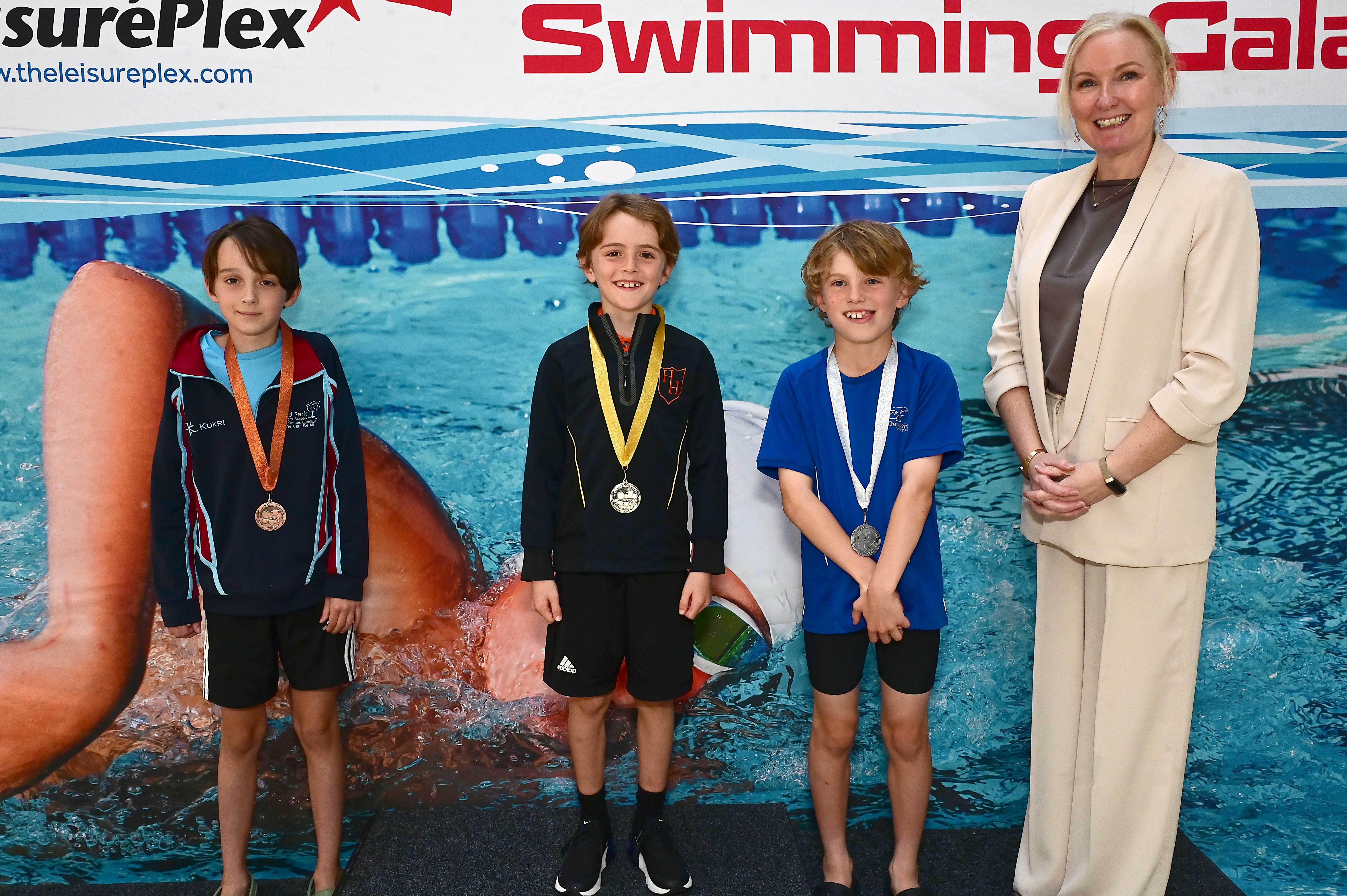 Louise Moore, Director of Leisure & Community Wellbeing presents Event 5 Breaststroke (non-club swimmers): 1st Ethan Neeson (Harmony Hill), 2nd Louis Gamble (Downshire) and 3rd Daniel Kee (Pond Park)