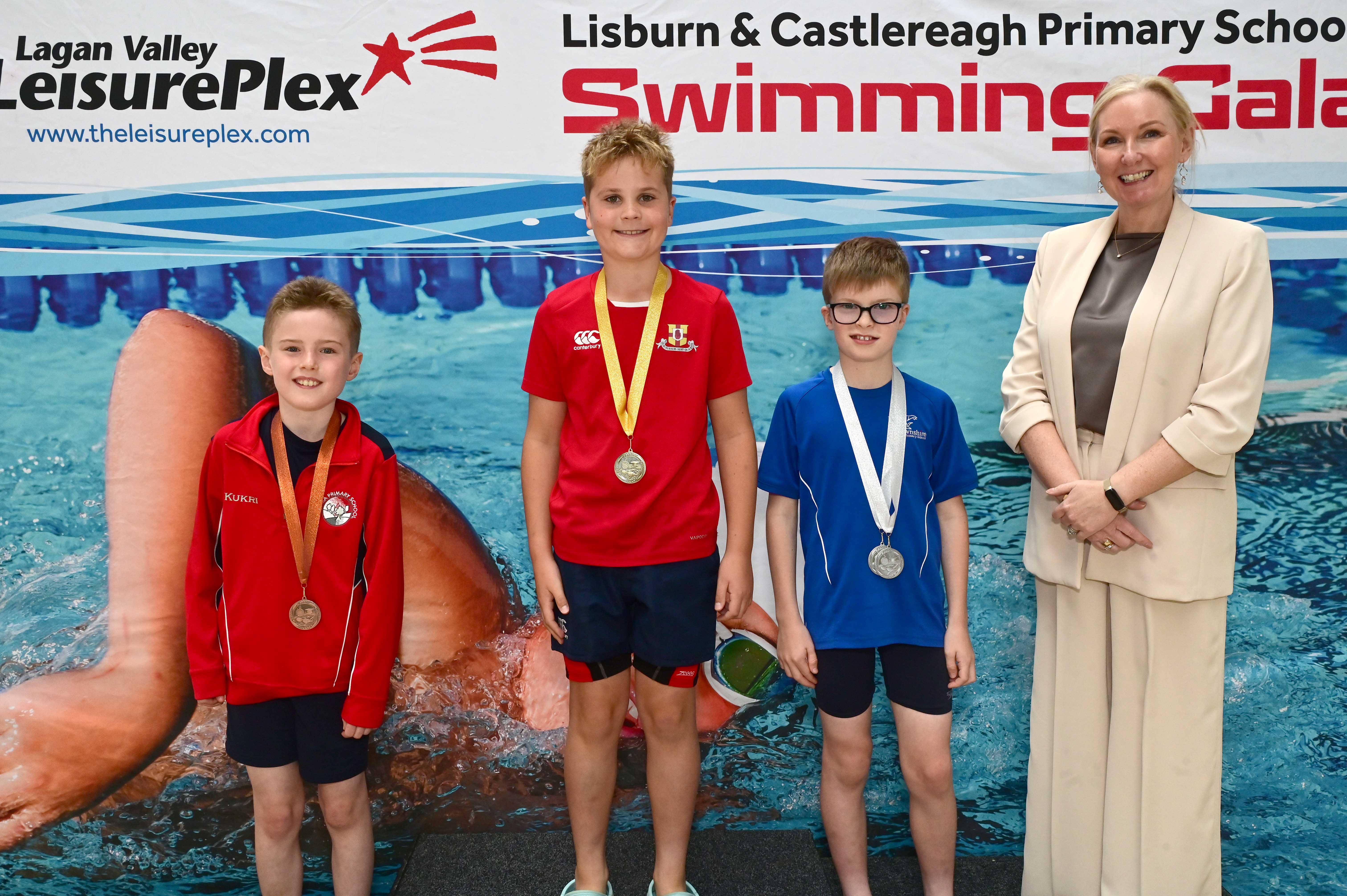 Louise Moore, Director of Leisure & Community Wellbeing presents Event 7 Breaststroke (non-club) to 1st Teddy Lewis (Friends’ Prep), 2nd Michael Spence (Downshire) and 3rd Harry Warnock (Moira) 