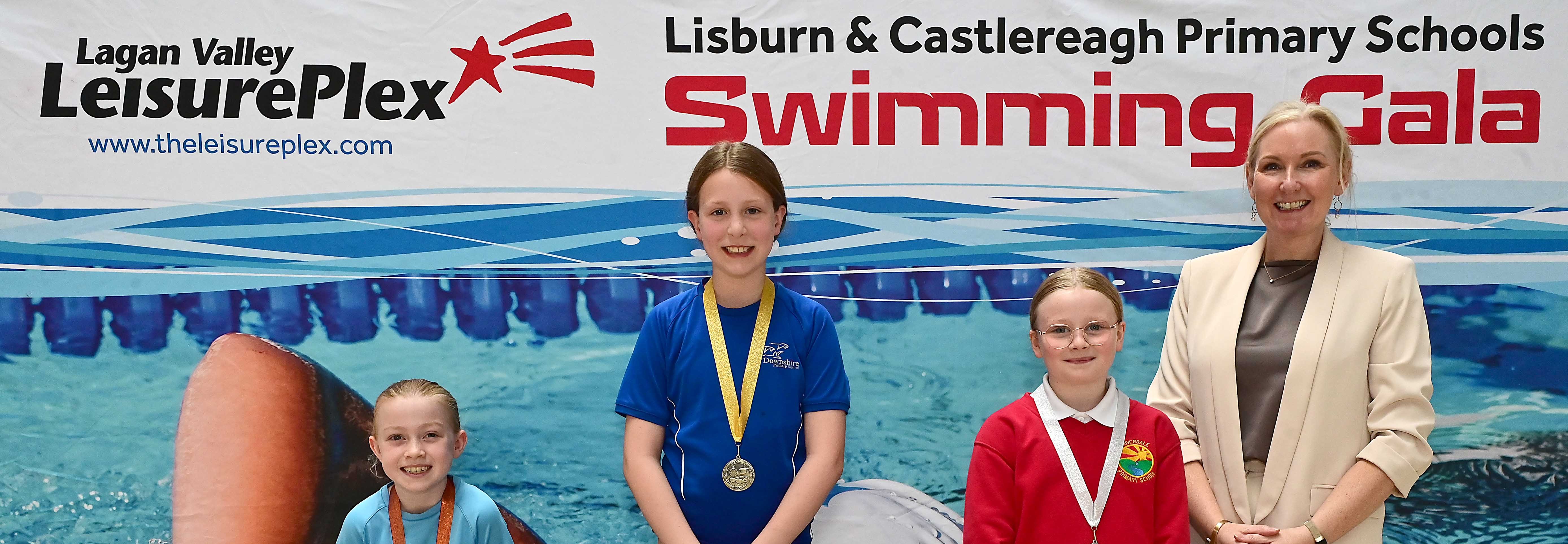Louise Moore, Director of Leisure & Community Wellbeing presents Event 8 Breaststroke (Club) to 1st Alannah Hamilton (Downshire), 2nd Ruth Martin (Riverdale) and 3rd Isla Devlin (Pond Park)  