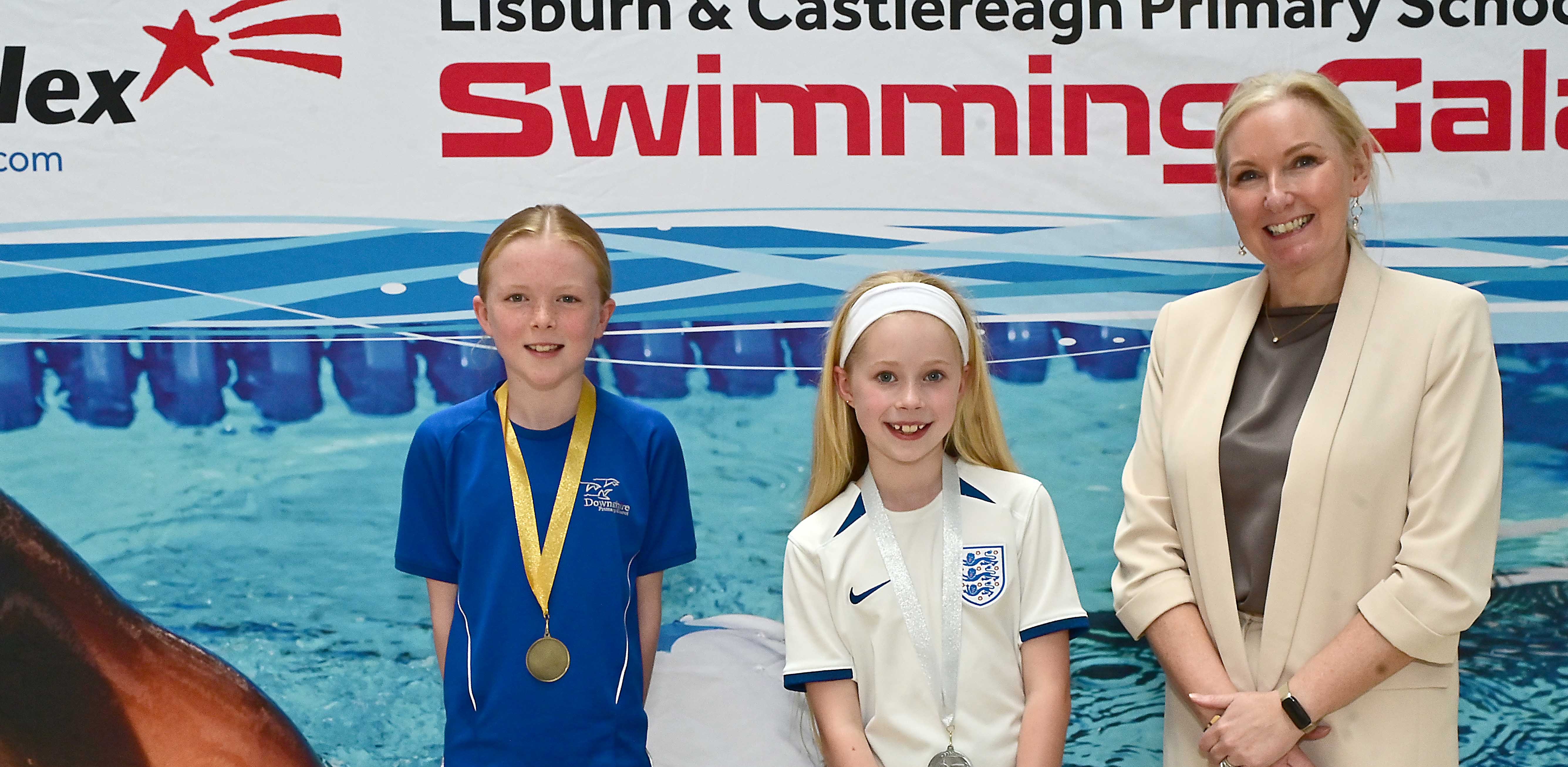 Louise Moore, Director of Leisure & Community Wellbeing presents Event 8 Breaststroke to 1st Katie Reid (Downshire), 2nd Harper Belshaw (Pond Park) and 3rd Robyn Fitzpatrick (Harmony Hill).  