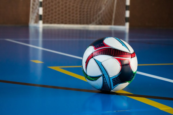 football on sports hall floor