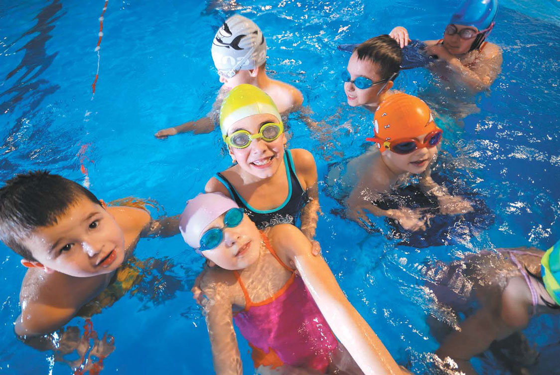 Kids Swimming with swimming goggles on