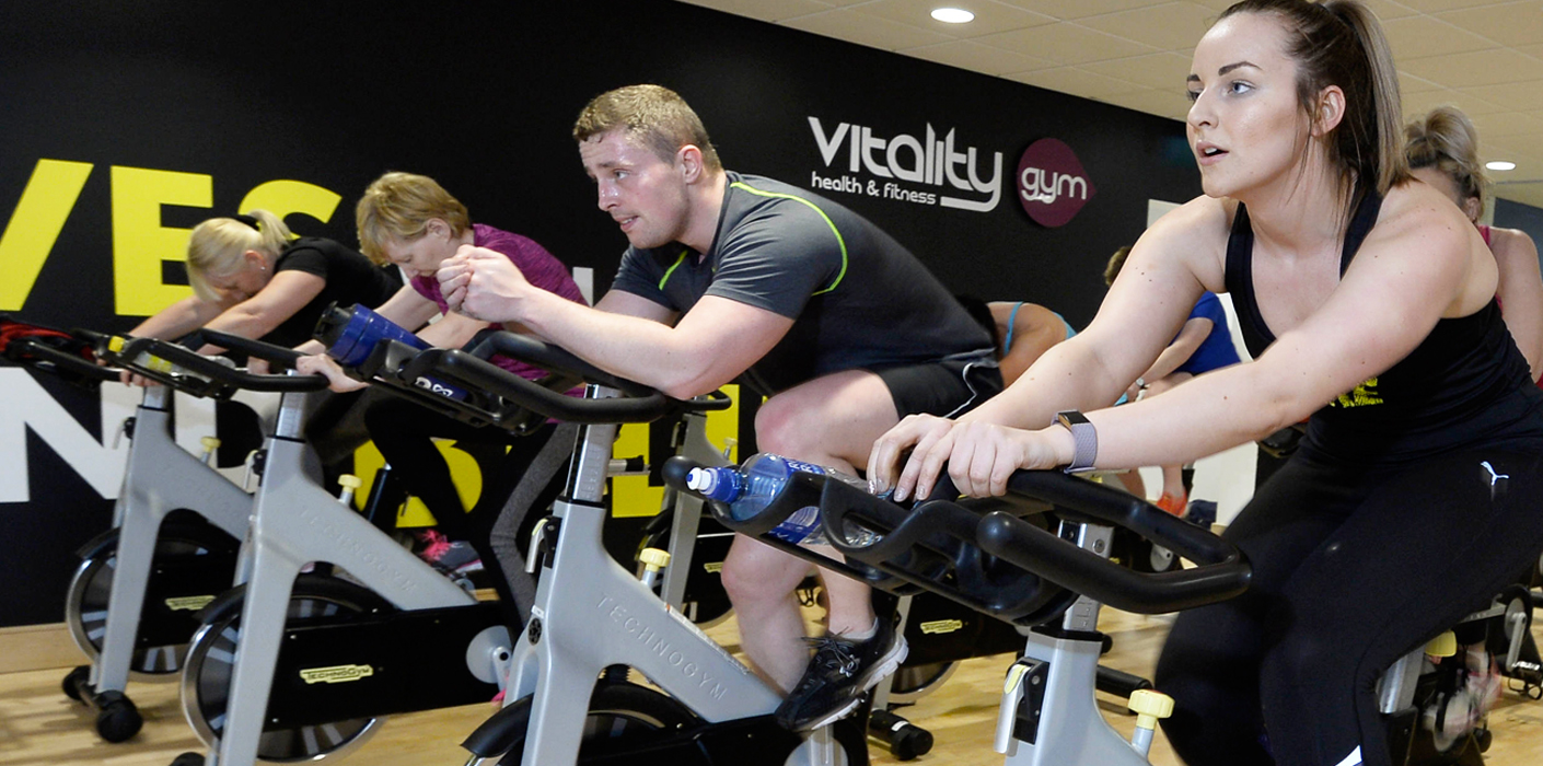 GYM man on exercise bike