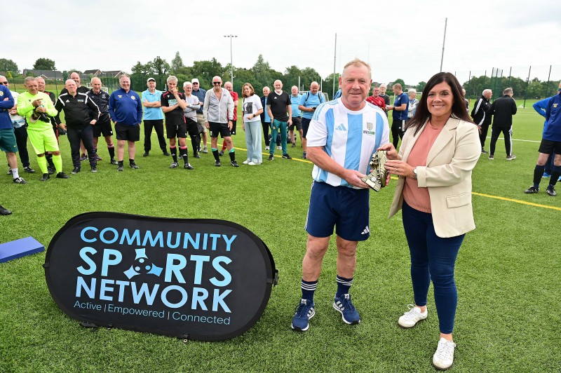 Pictured: ‘Player of the Tournament’ Ronnie Carleton, from Ballymena with Chair of the Communities and Wellbeing Committee, Councillor Sharon Lowry