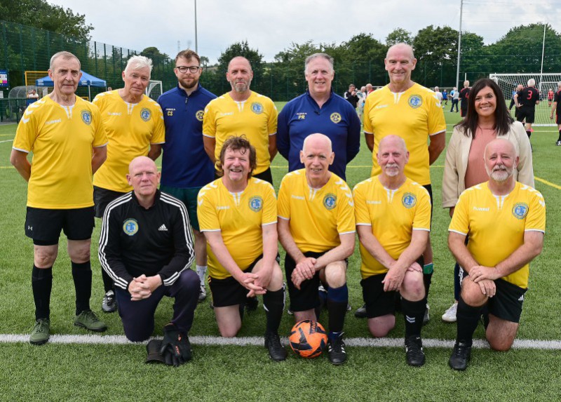 Pictured: Carryduff Swifts Walking Football team with Chair of the Communities and Wellbeing Committee, Councillor Sharon Lowry
